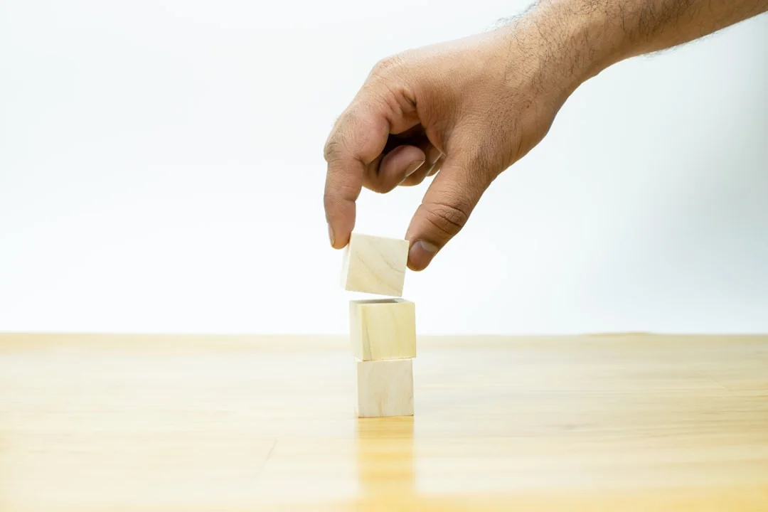 Scrabble tiles spelling SEO on a wooden surface. Ideal for digital marketing themes.